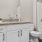 a bathroom with a marble countertop