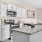 a kitchen with white cabinets