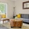 a living room with a couch and a table